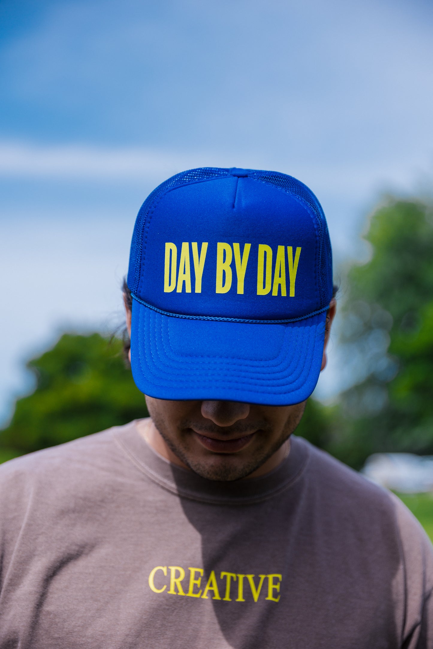 Day by Day Trucker Hat